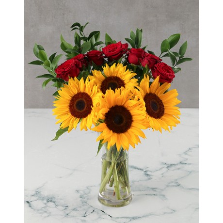 Sunflowers and red rose vase